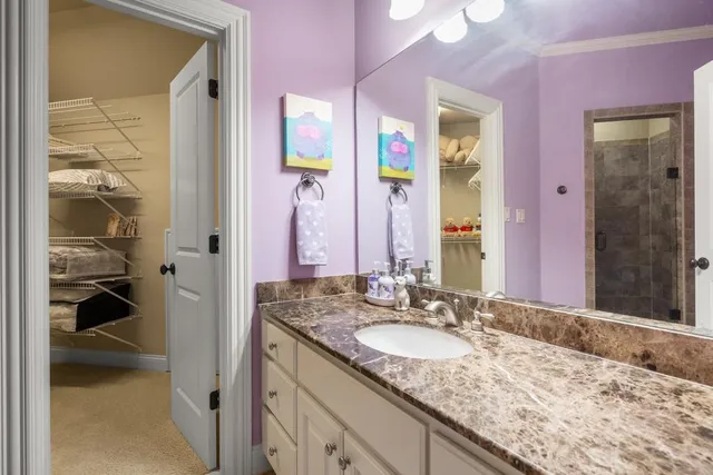 a living room with stainless steel appliances kitchen island granite countertop furniture and a large window