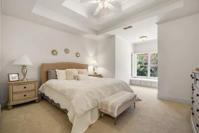 a room with table chairs and entryway