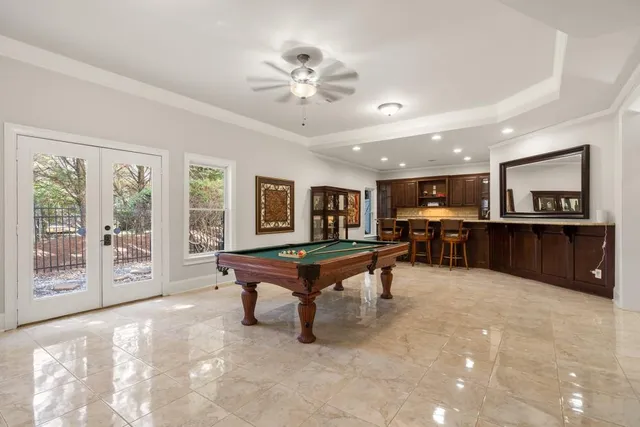 a view of backyard with swimming pool