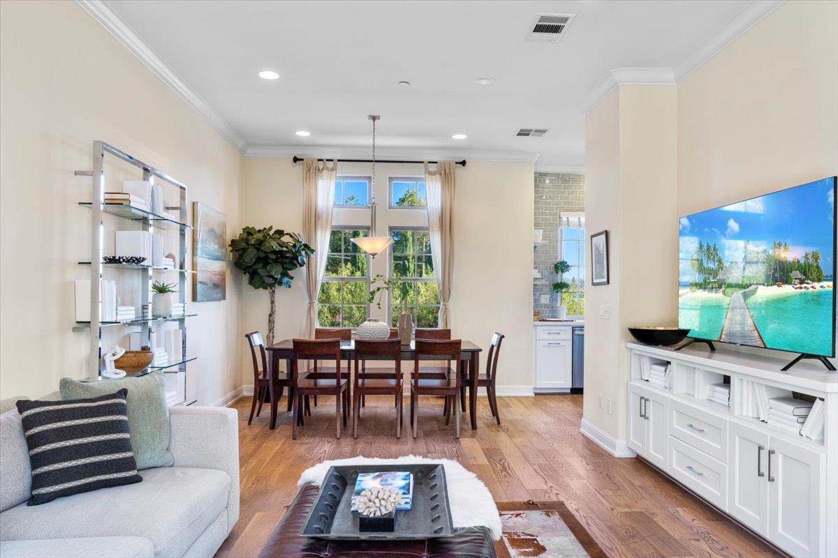 725 Reflection Way Mountain View, CA 94043 - Photo 11 of 39 a view of a dining room with furniture window and wooden floor