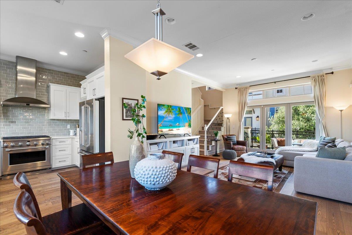 725 Reflection Way Mountain View, CA 94043 - Photo 15 of 39 a living room with fireplace furniture and a large window