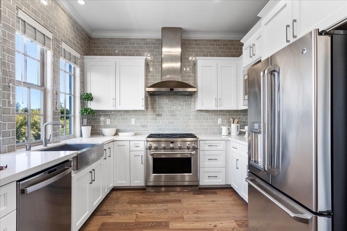 725 Reflection Way Mountain View, CA 94043 - Photo 16 of 39 a kitchen with stainless steel appliances a stove sink and refrigerator