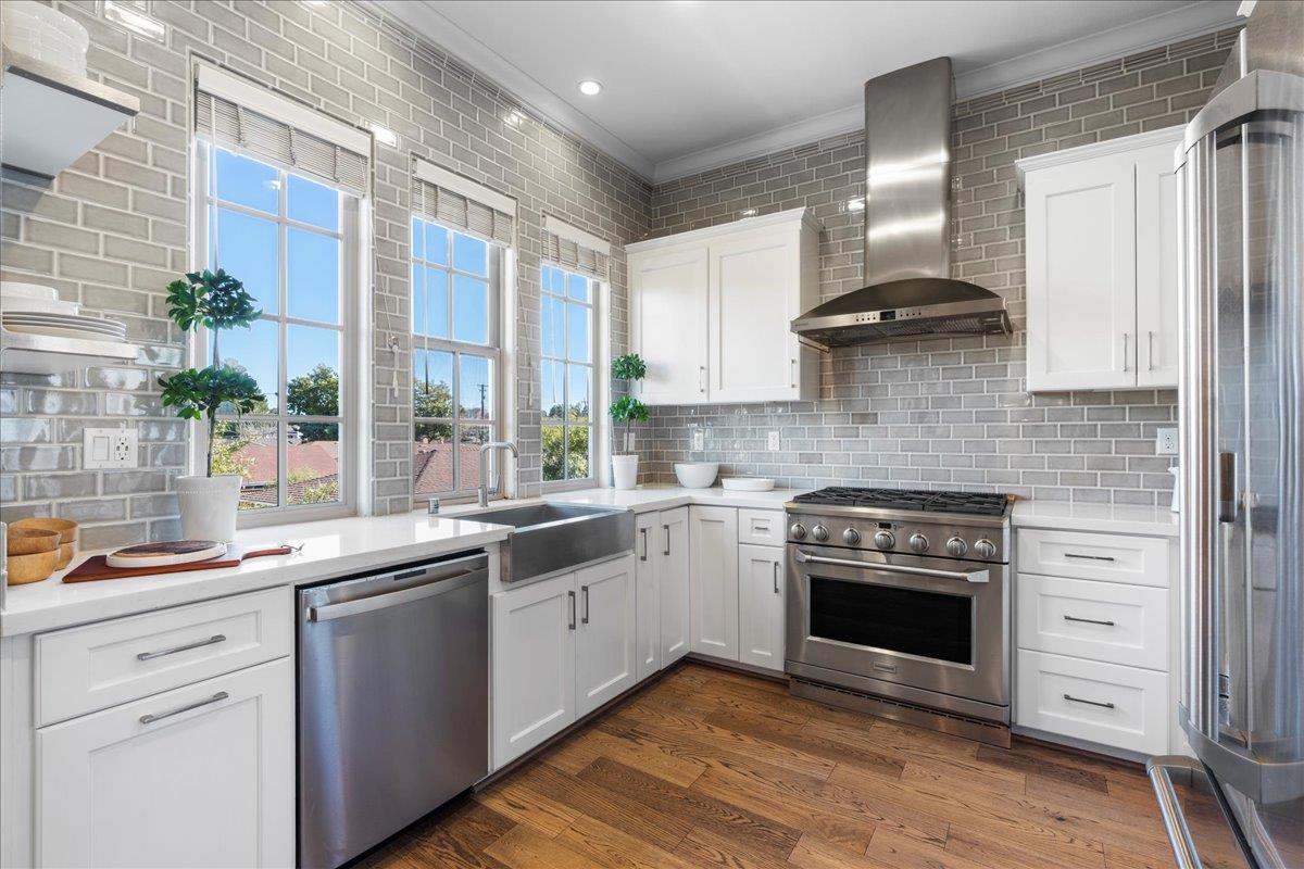 725 Reflection Way Mountain View, CA 94043 - Photo 17 of 39 a kitchen with a sink stove and cabinets
