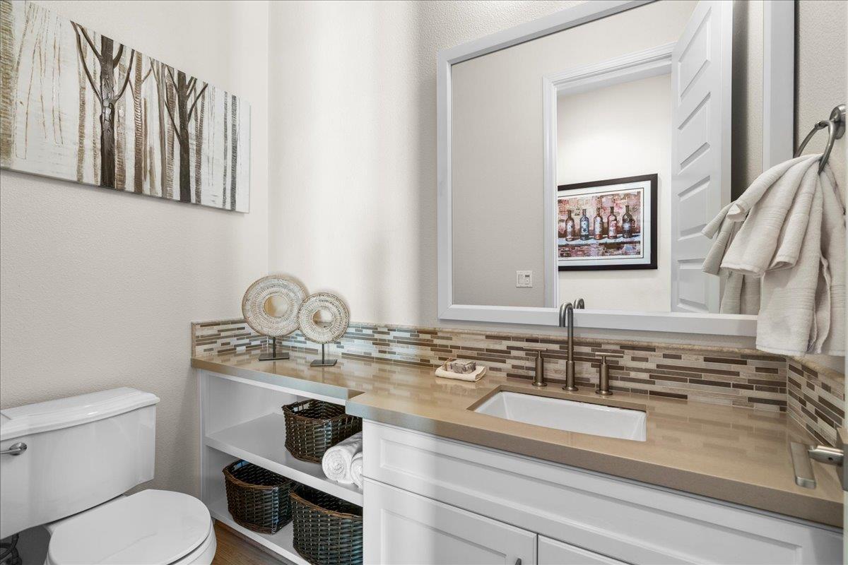 725 Reflection Way Mountain View, CA 94043 - Photo 20 of 39 a bathroom with a granite countertop toilet sink and mirror