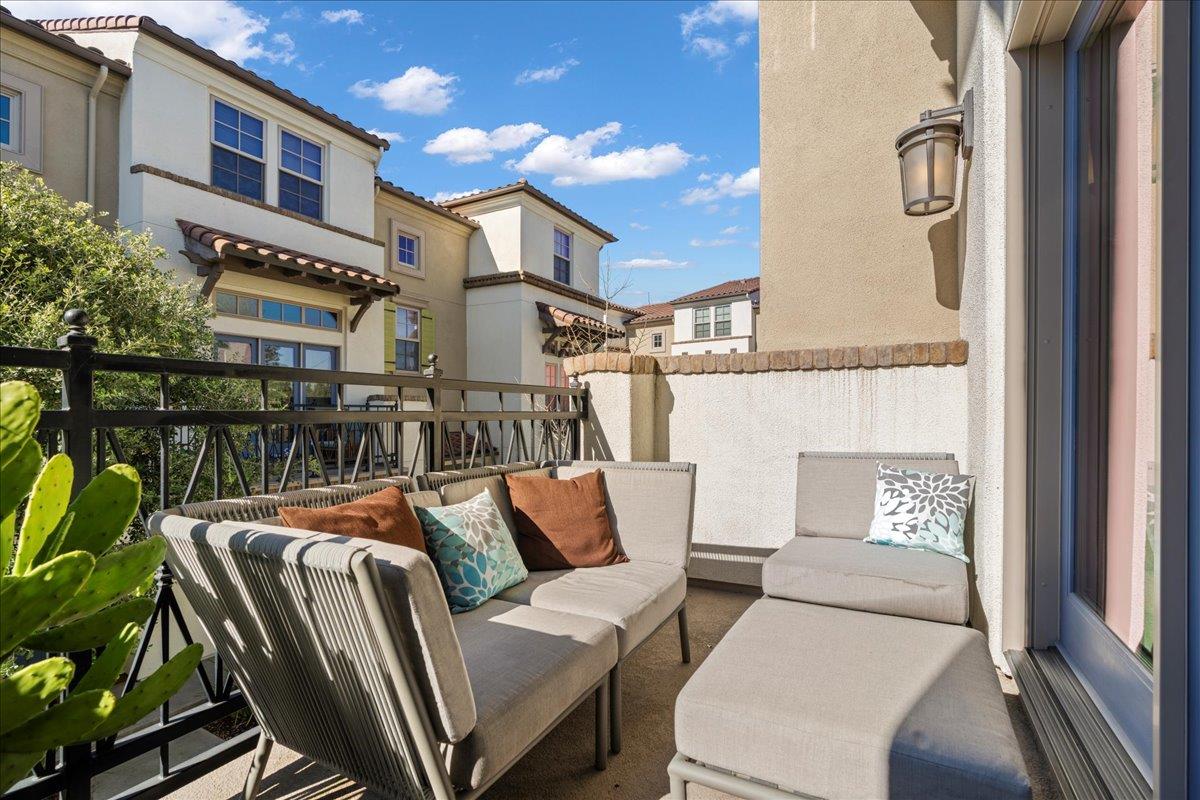 725 Reflection Way Mountain View, CA 94043 - Photo 21 of 39 a balcony with furniture and a potted plant