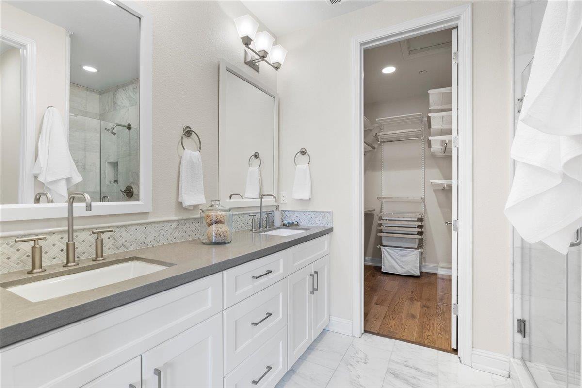 725 Reflection Way Mountain View, CA 94043 - Photo 28 of 39 a bathroom with a granite countertop double vanity sink mirror and