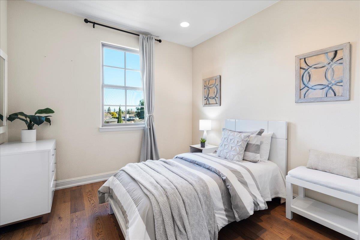 725 Reflection Way Mountain View, CA 94043 - Photo 31 of 39 a bedroom with a bed and a window