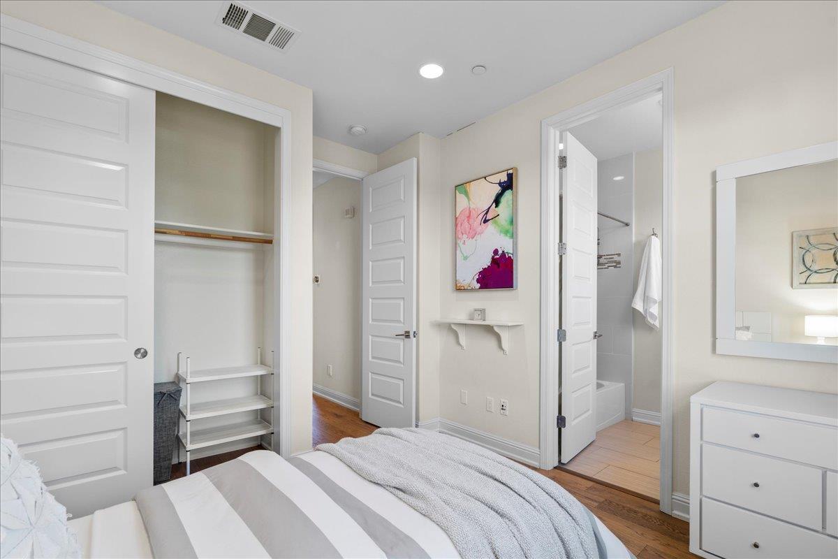 725 Reflection Way Mountain View, CA 94043 - Photo 32 of 39 a view of a bedroom with bed and closet
