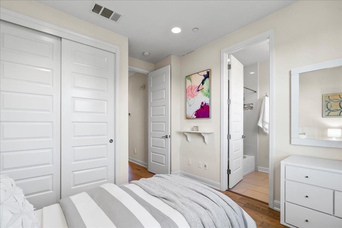 725 Reflection Way Mountain View, CA 94043 - Photo 33 of 39 a bedroom with a bed and a cabinets