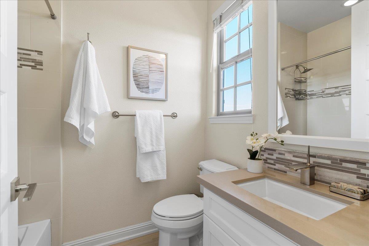 725 Reflection Way Mountain View, CA 94043 - Photo 34 of 39 a bathroom with a sink a toilet and a mirror