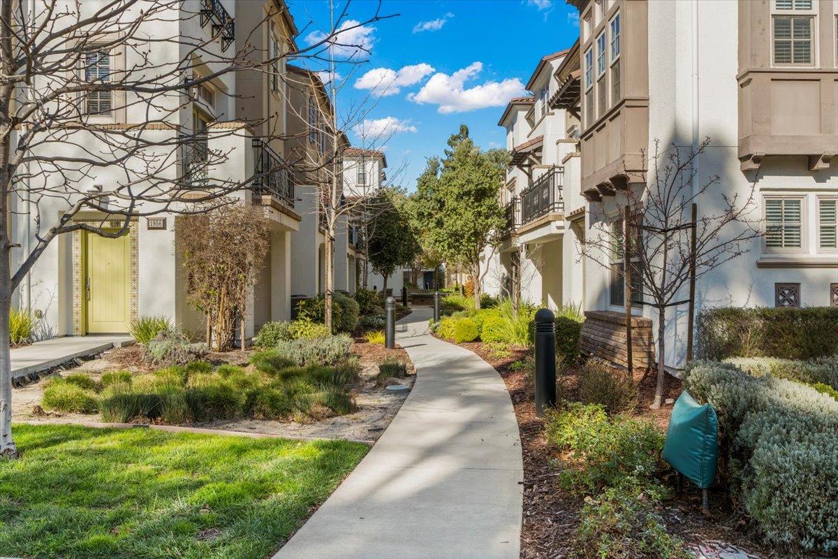 725 Reflection Way Mountain View, CA 94043 - Photo 35 of 39 a view of a brick building next to a yard