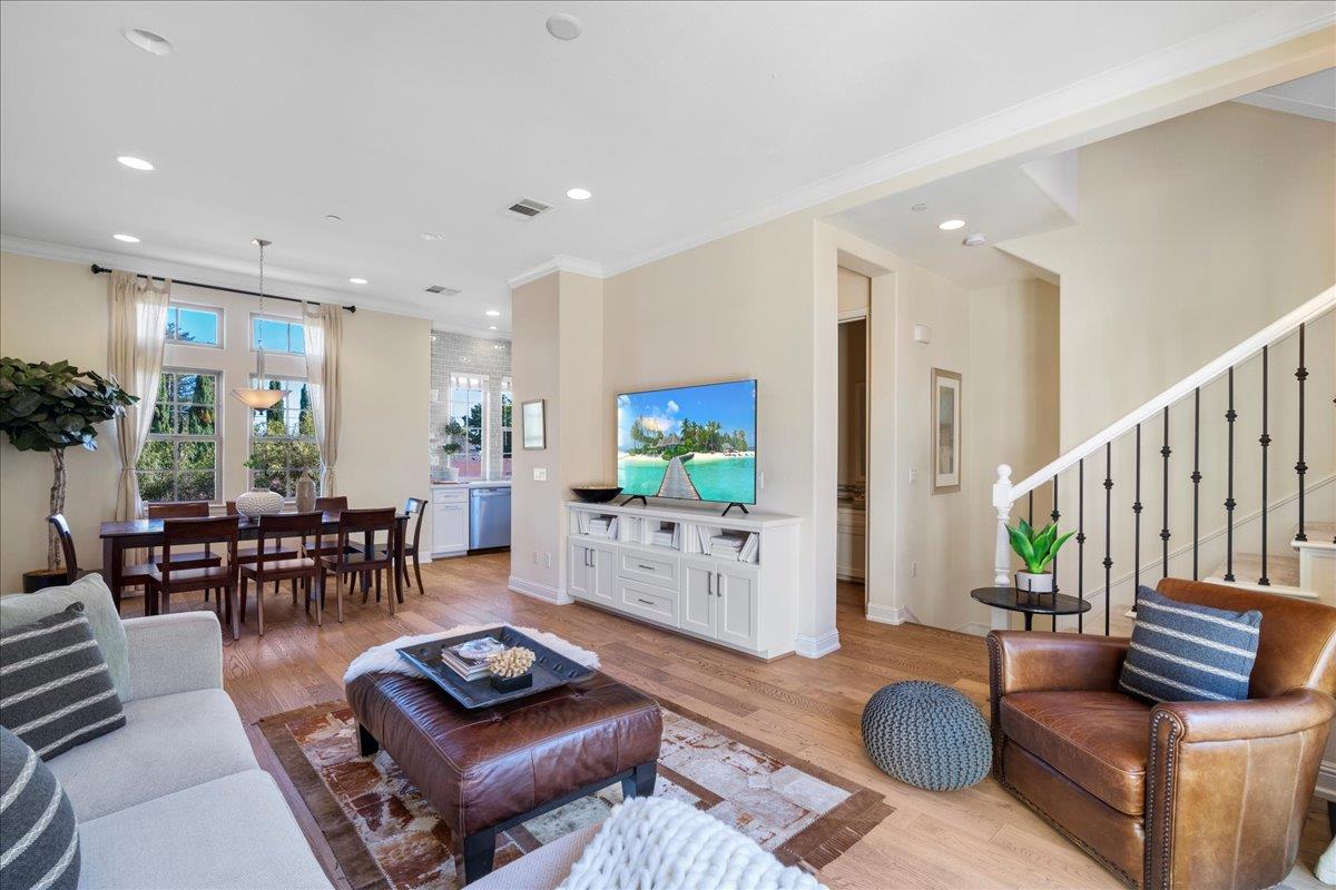 725 Reflection Way Mountain View, CA 94043 - Photo 6 of 39 a living room with furniture and a flat screen tv