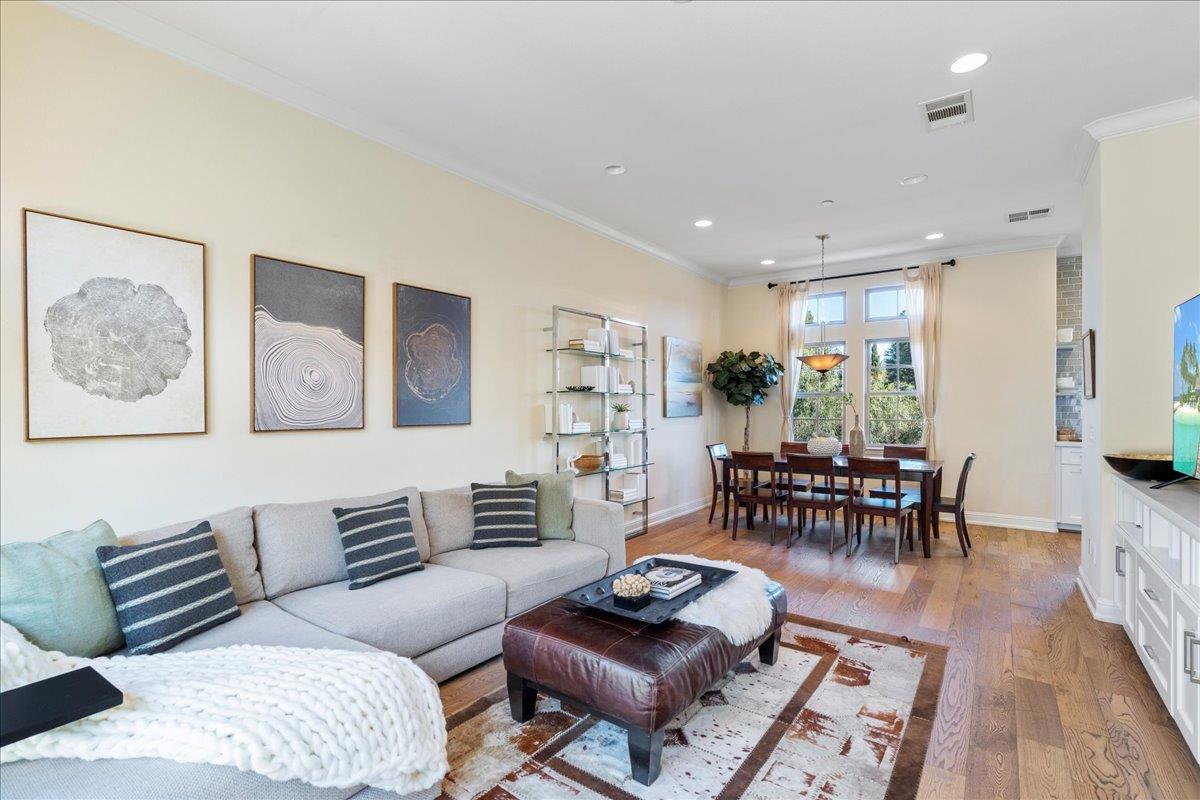 725 Reflection Way Mountain View, CA 94043 - Photo 8 of 39 a living room with furniture and wooden floor
