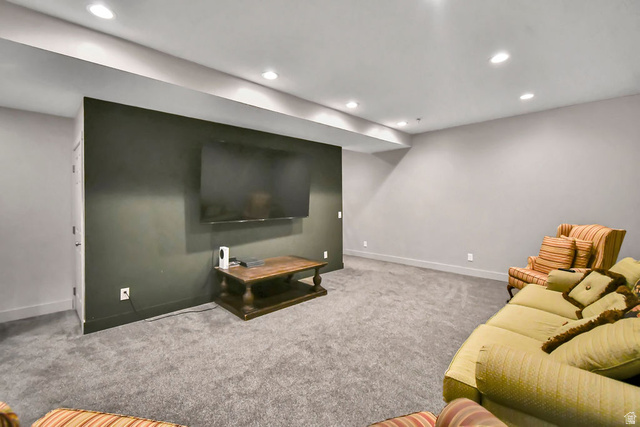 544 East 600 North, Unit 1 Joseph, UT 84739 - Photo 31 of 65 Spacious room featuring plush gray carpeting, recessed ceiling lighting, a dark accent wall, and white baseboards