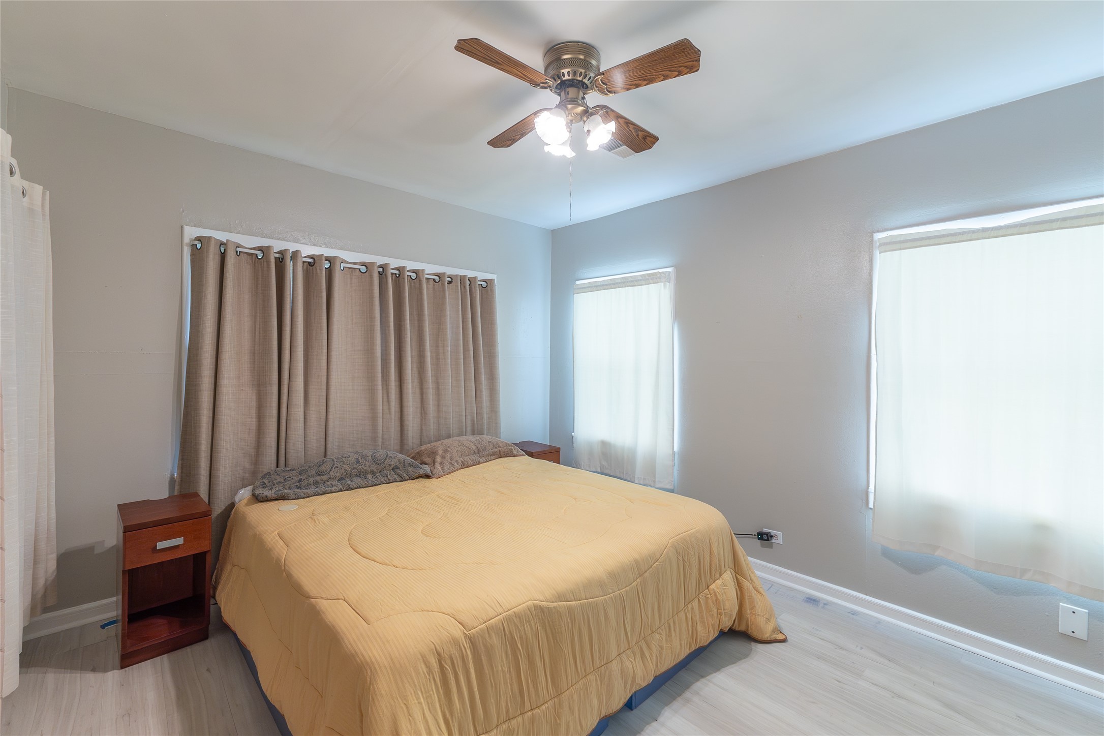 2118 Rolling Hills Road Conroe, TX 77303 - Photo 23 of 39 Spacious bedroom offers a peaceful retreat at the end of the day.