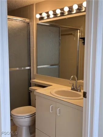 a bathroom with a sink and a toilet