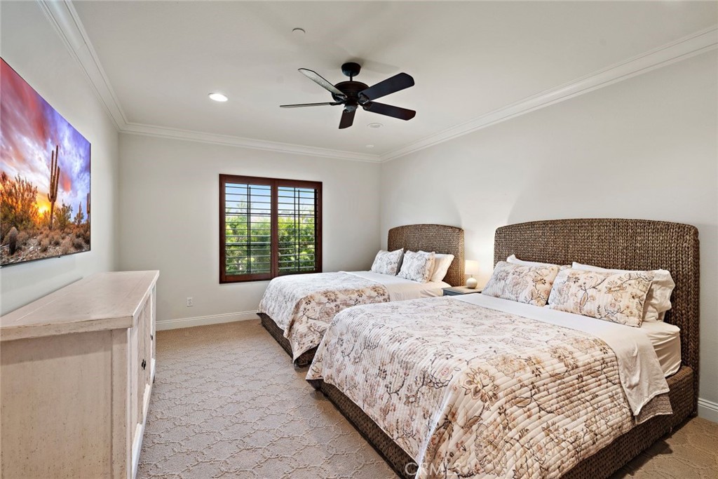 5 Via Monarca Street Dana Point, CA 92629 - Photo 30 of 64 a bedroom with a bed and a flat screen tv