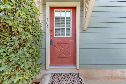 a view of entrance gate of a house