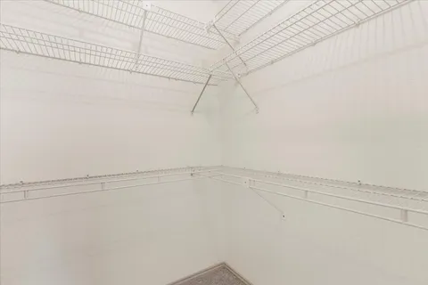 a view of a room with racks on the wall