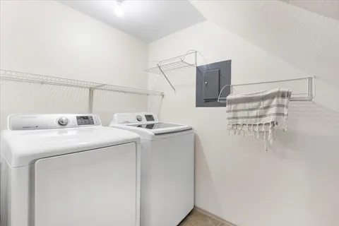 a utility room with dryer and washer