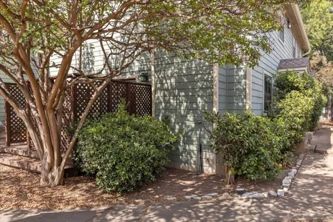 a backyard of a house with lots of green space