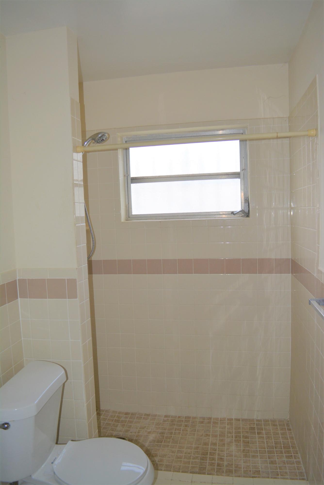 28520 Southwest 146th Avenue Homestead, FL 33033 - Photo 12 of 23 a bathroom with a toilet and a shower
