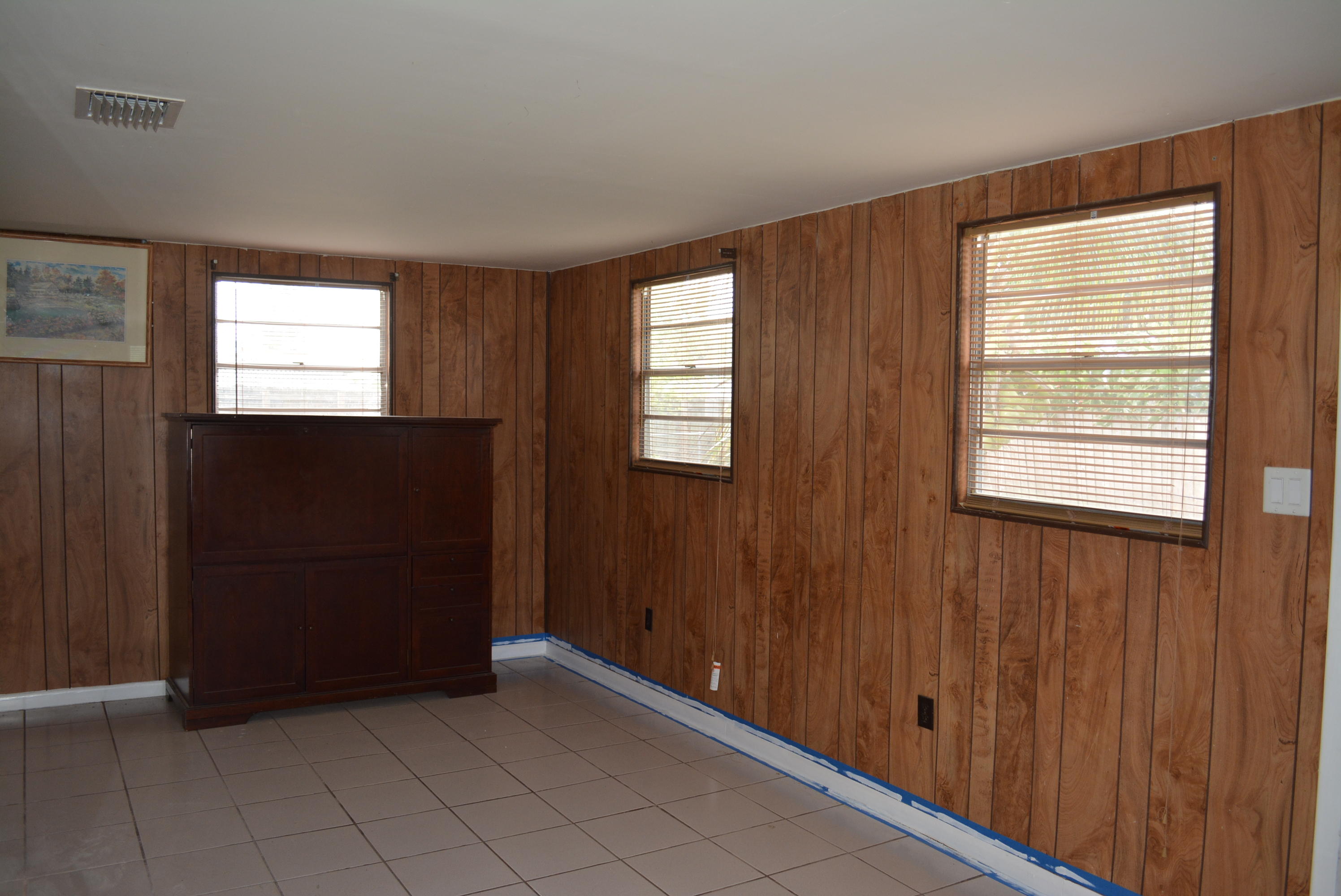 28520 Southwest 146th Avenue Homestead, FL 33033 - Photo 15 of 23 an empty room with windows