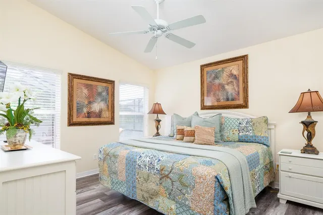 a bedroom with a bed and a table