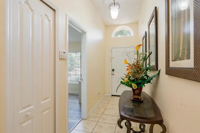 a view of hall way with mirror