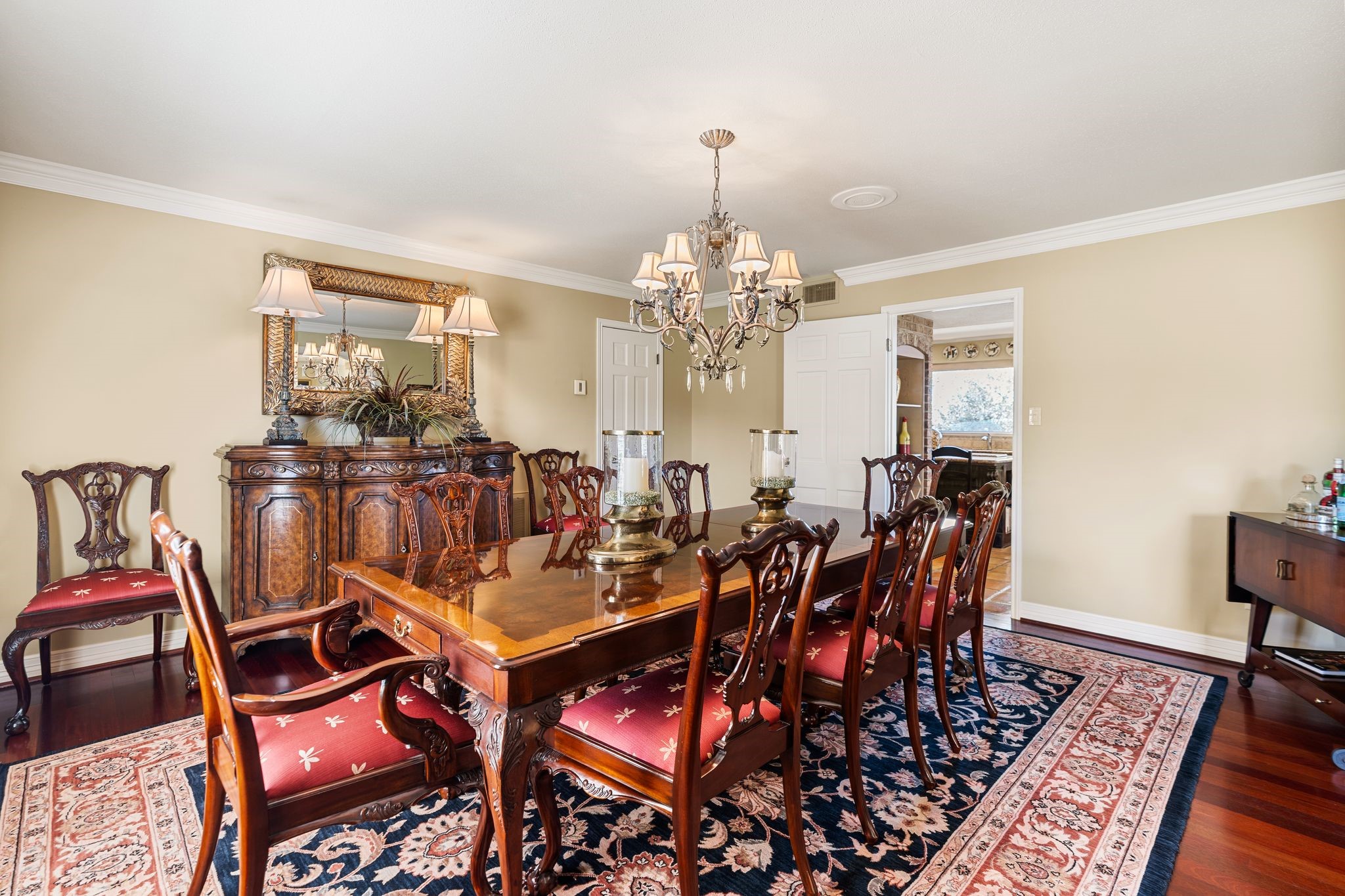 905 Sunny Lane Wharton, TX 77488 - Photo 12 of 50 a view of a dining room with furniture and chandelier