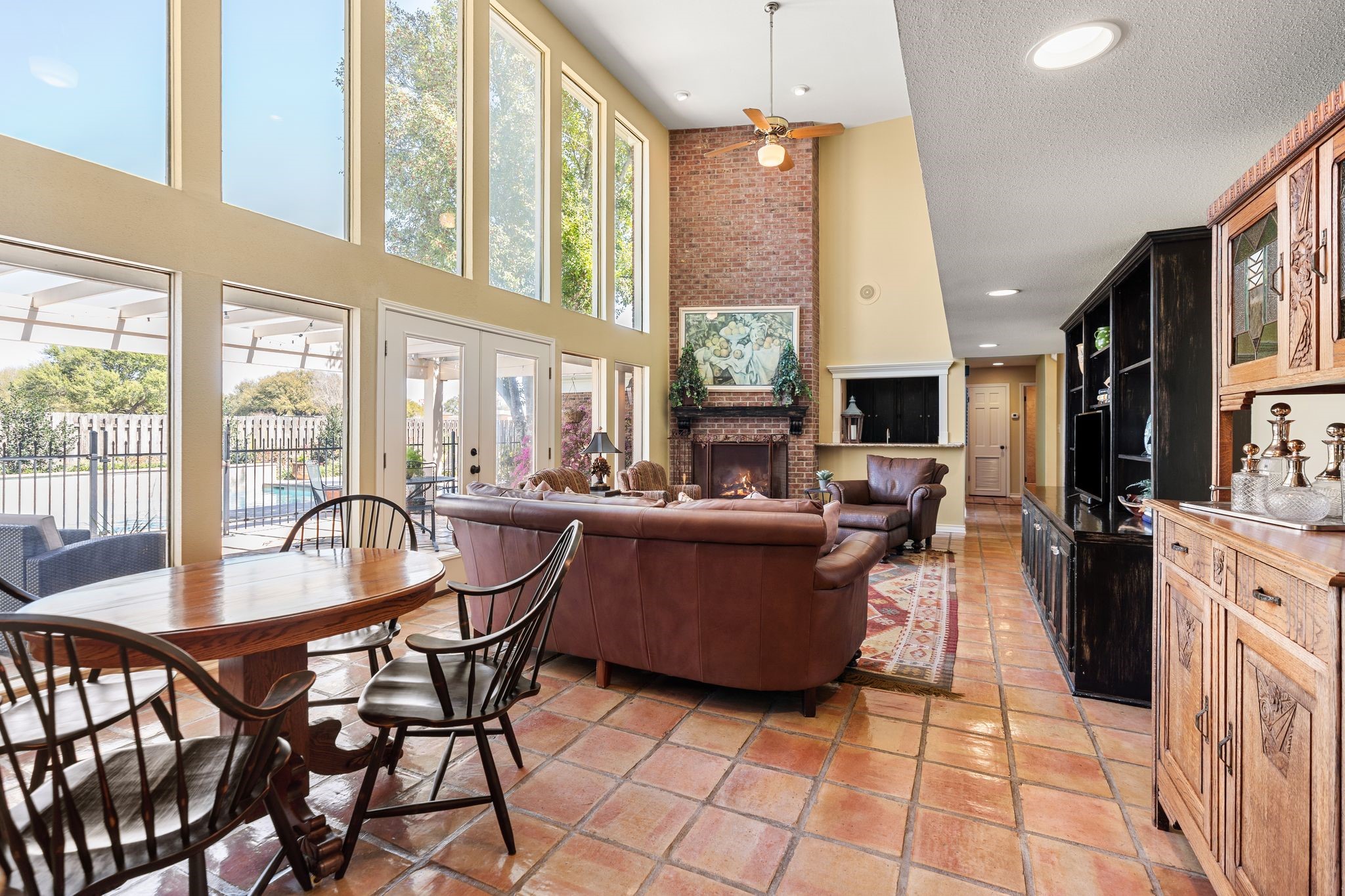 905 Sunny Lane Wharton, TX 77488 - Photo 19 of 50 a dining room with furniture and a floor to ceiling window
