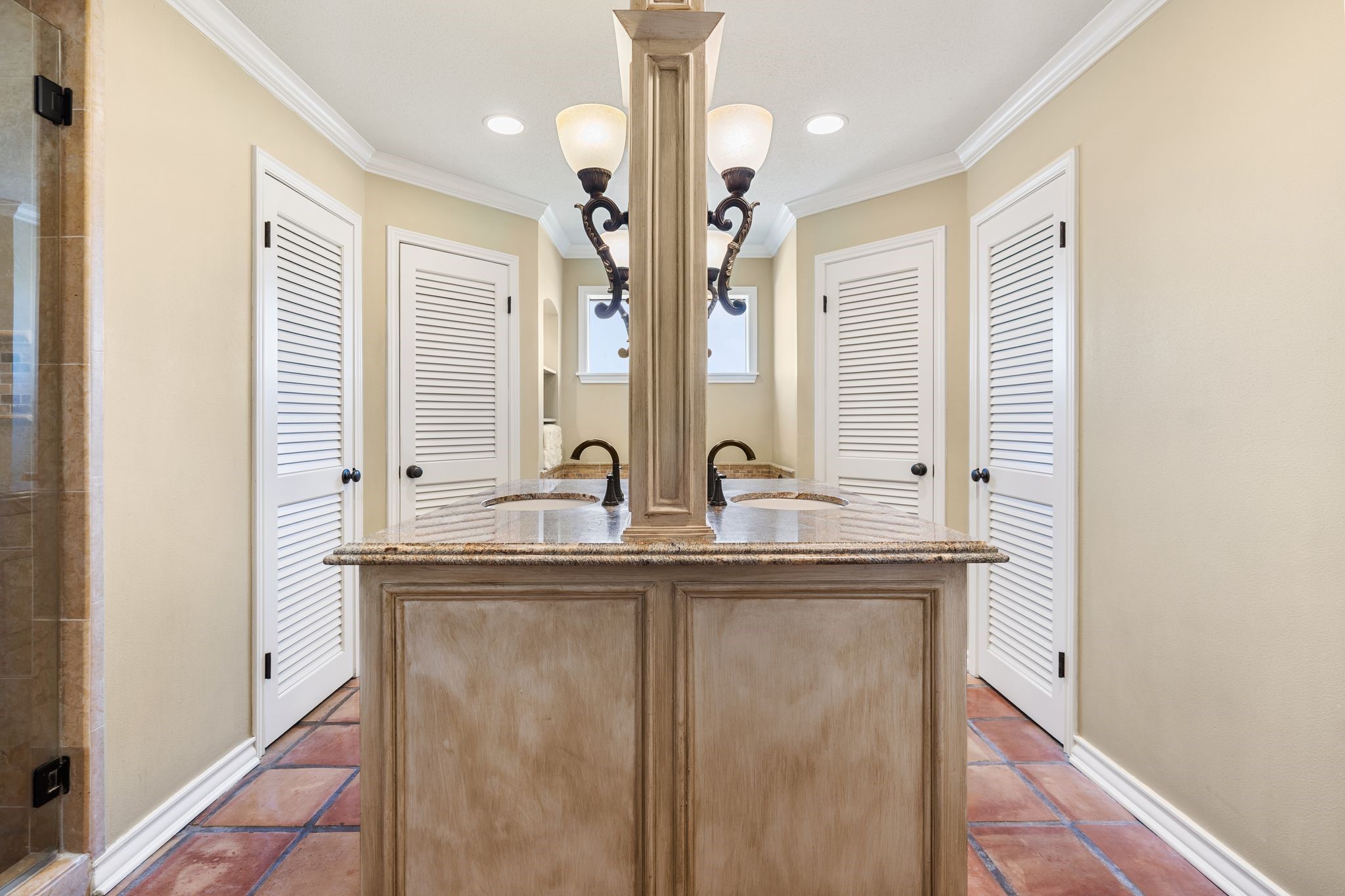 905 Sunny Lane Wharton, TX 77488 - Photo 27 of 50 a kitchen with stainless steel appliances granite countertop a sink and a large mirror