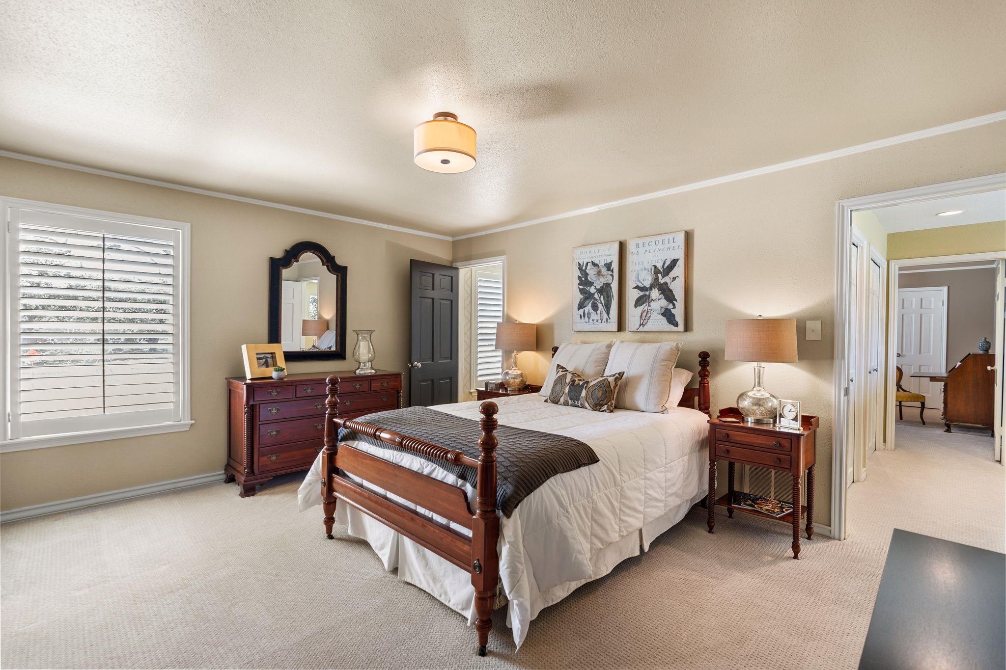 905 Sunny Lane Wharton, TX 77488 - Photo 37 of 50 a spacious bedroom with a bed and a dresser in it