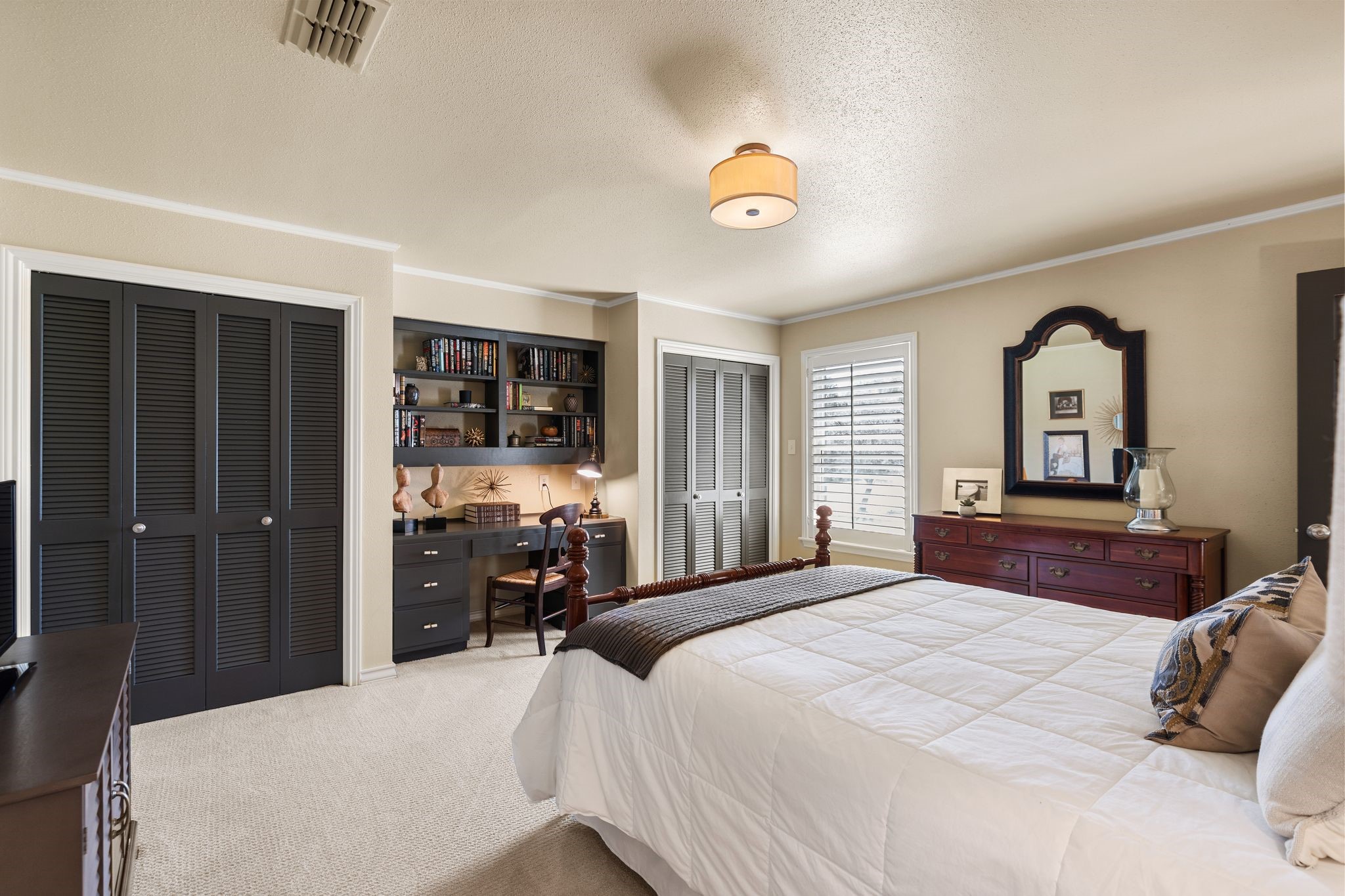 905 Sunny Lane Wharton, TX 77488 - Photo 38 of 50 a bedroom with a bed and a dresser