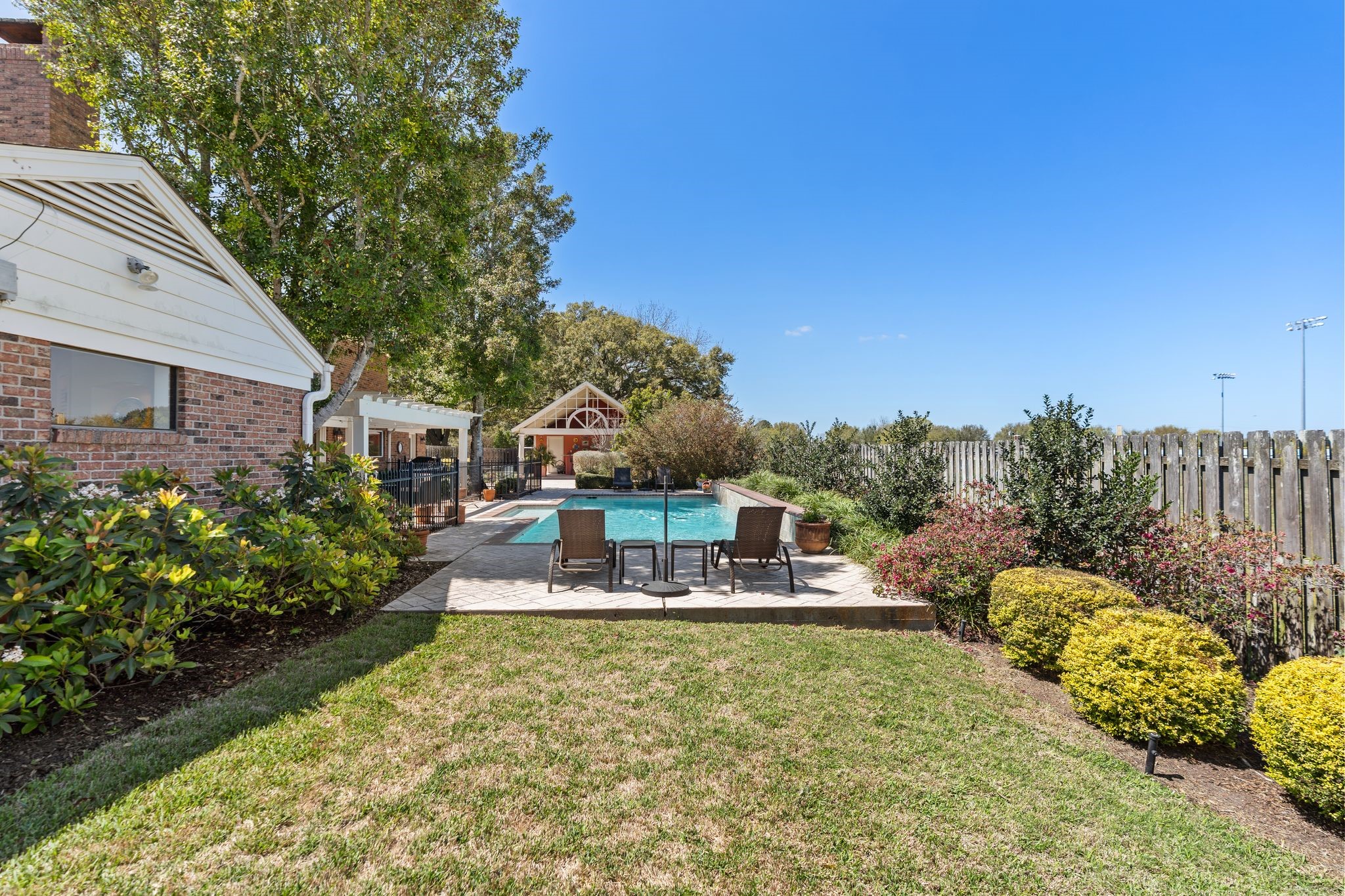 905 Sunny Lane Wharton, TX 77488 - Photo 45 of 50 a view of a house with a yard from a patio