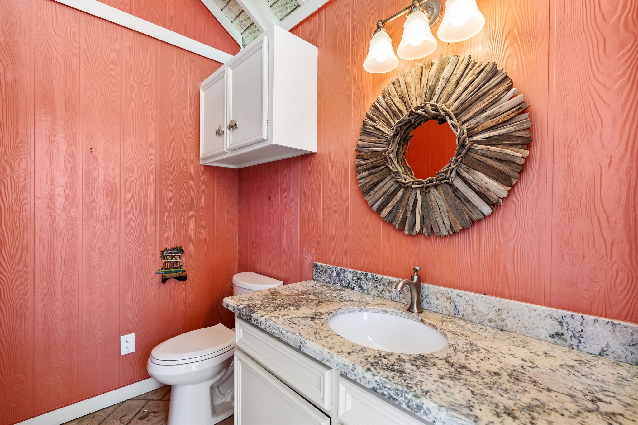905 Sunny Lane Wharton, TX 77488 - Photo 49 of 50 a bathroom with a sink and a mirror