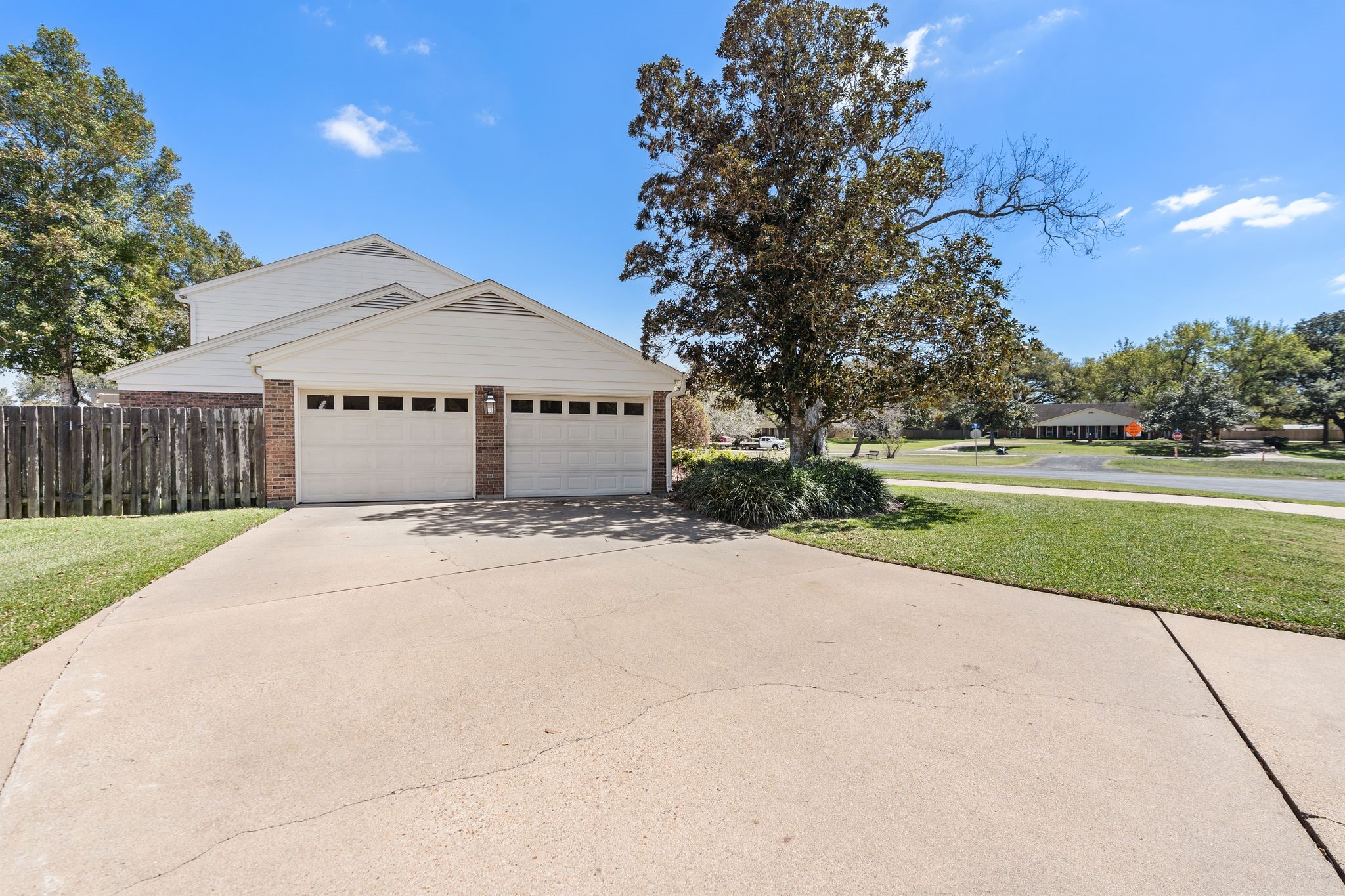 905 Sunny Lane Wharton, TX 77488 - Photo 50 of 50 a front view of a house with a yard and road