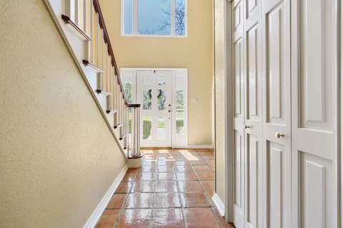 a kitchen with stainless steel appliances granite countertop a stove and a sink