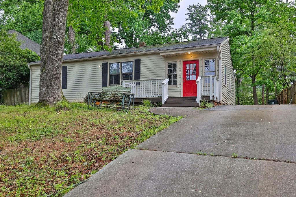 1968 Mendenhall Street Chamblee, GA 30341 - Photo 1 of 1 a front view of house with yard and green space