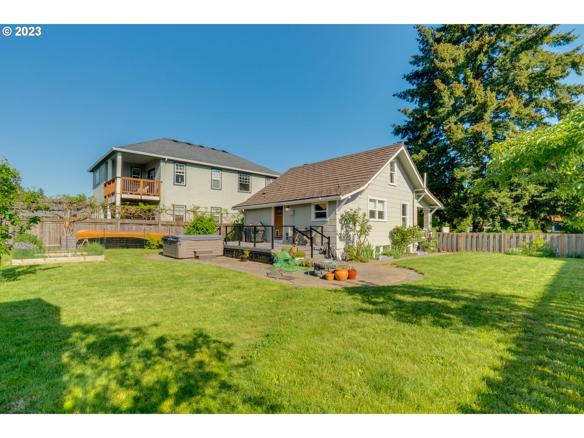 4504 Northeast Alberta Court Portland, OR 97218 - Photo 33 of 37 a front view of a house with a yard