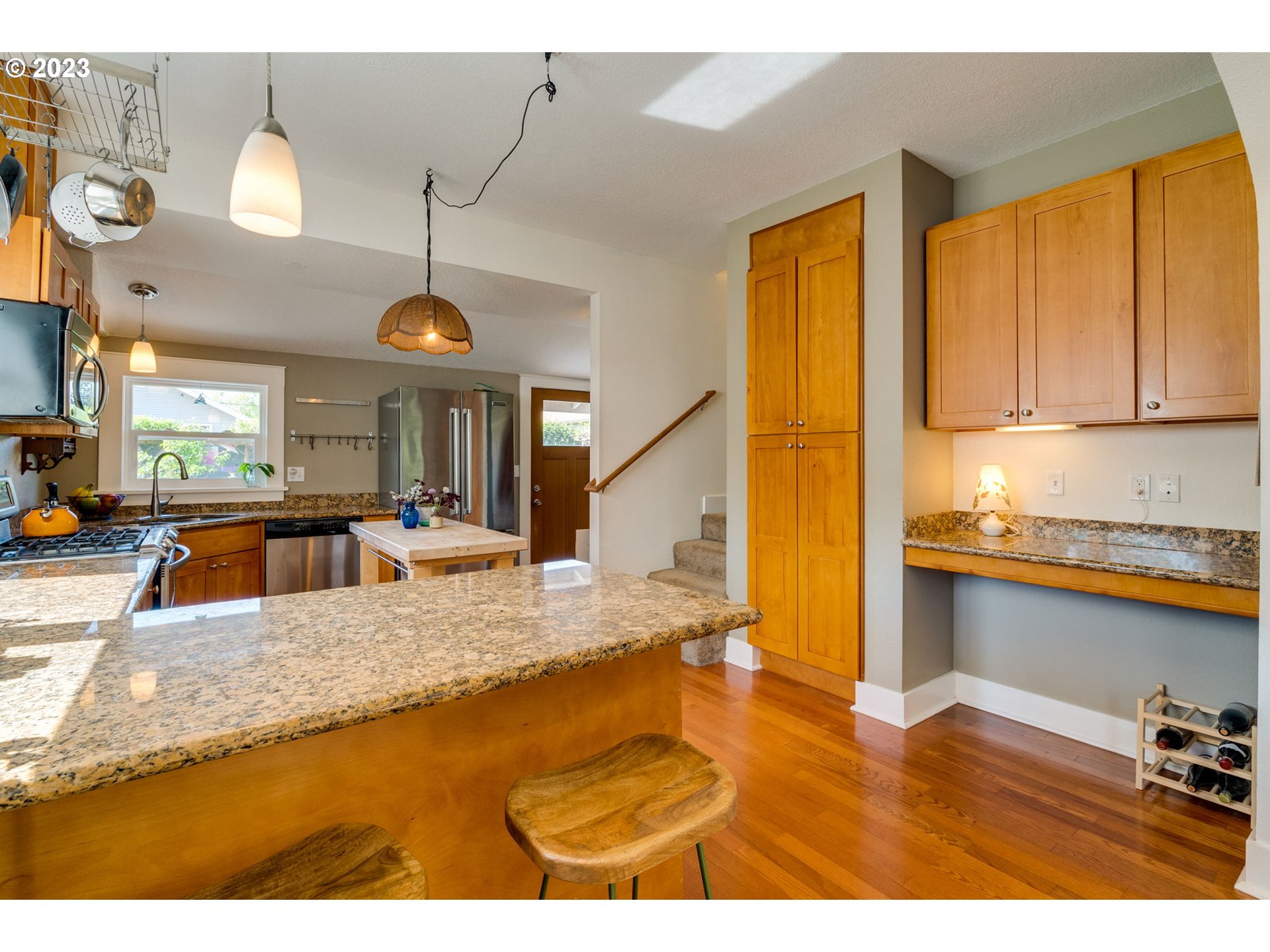 4504 Northeast Alberta Court Portland, OR 97218 - Photo 10 of 37 a view of a living room and kitchen