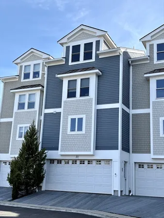 a front view of residential houses