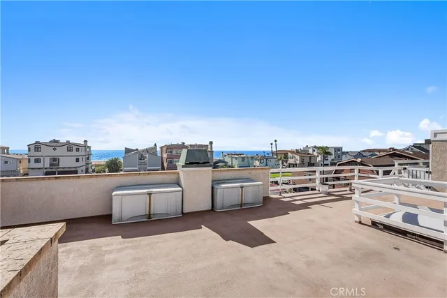 aerial view of a house with a yard