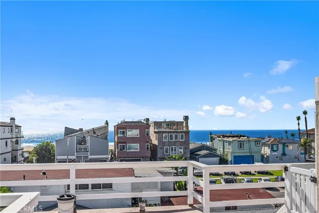 a view of a garden with a building