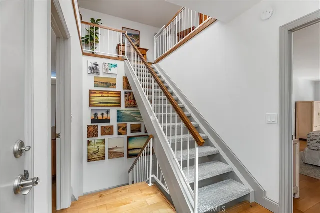 a large kitchen with a large counter top sink stove and refrigerator