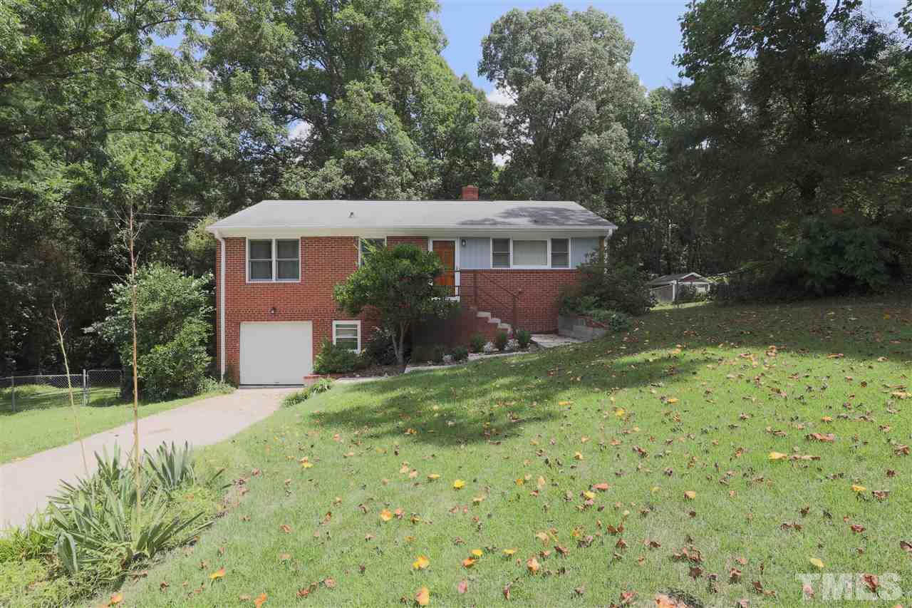 3501 Cranston Road Garner, NC 27529 - Photo 1 of 18 a front view of a house with garden