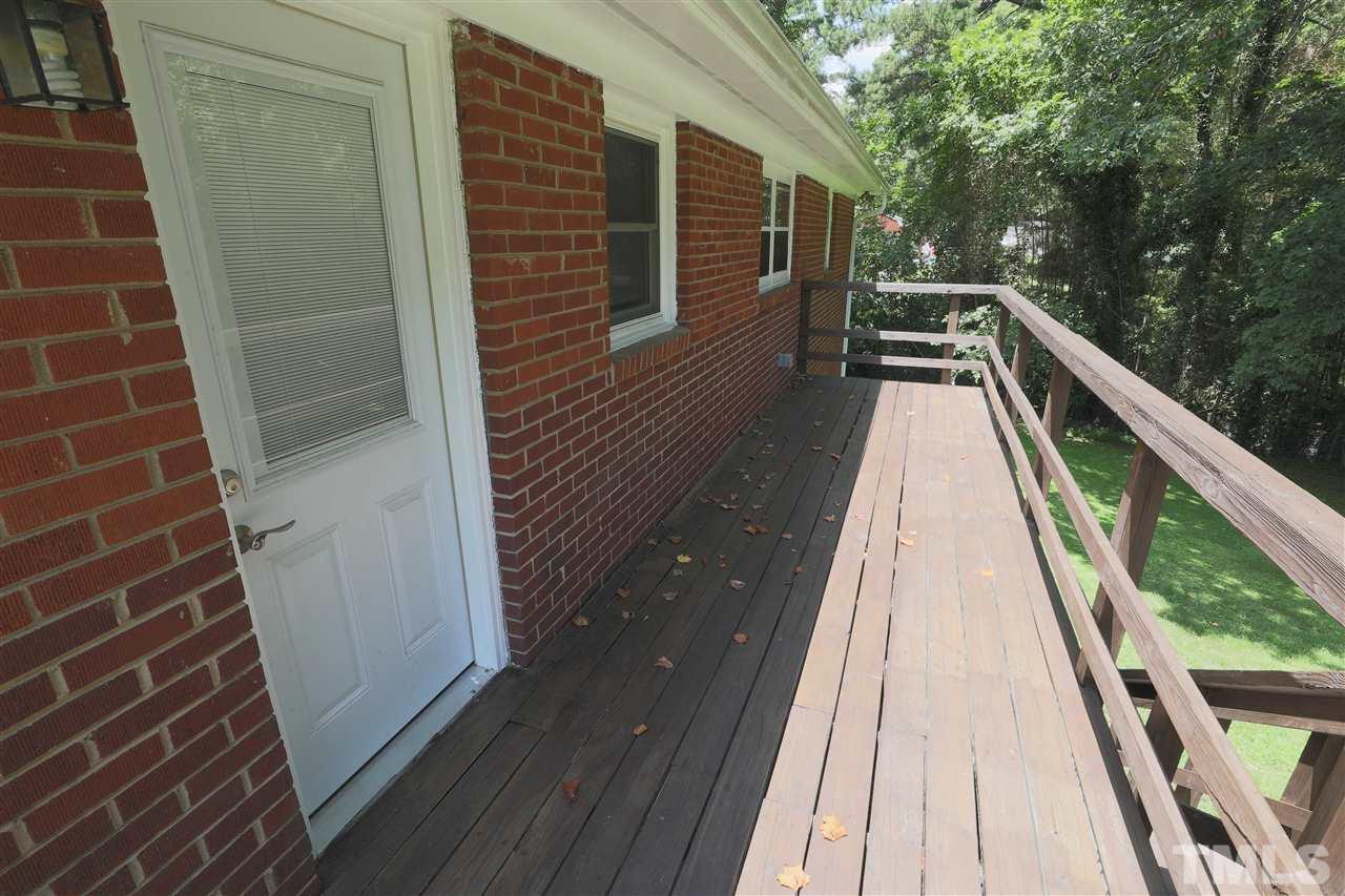 3501 Cranston Road Garner, NC 27529 - Photo 15 of 18 a view of balcony with wooden floor and fence