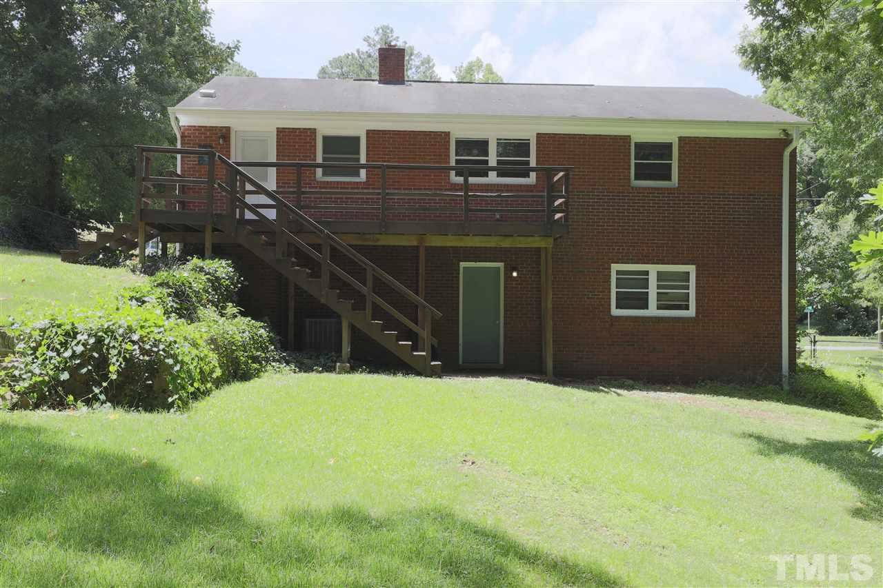 3501 Cranston Road Garner, NC 27529 - Photo 16 of 18 a front view of a house with a yard