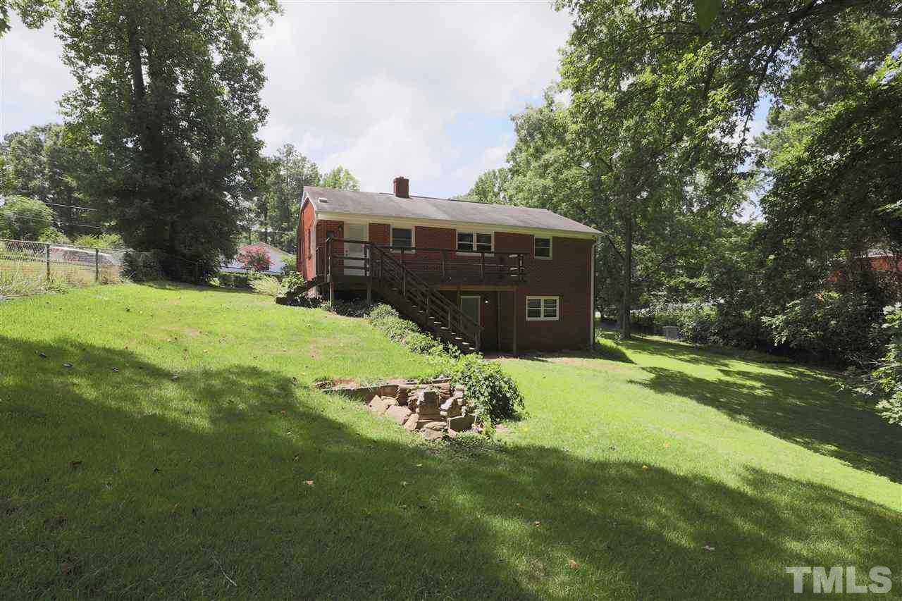 3501 Cranston Road Garner, NC 27529 - Photo 17 of 18 a view of a house with a yard and sitting area
