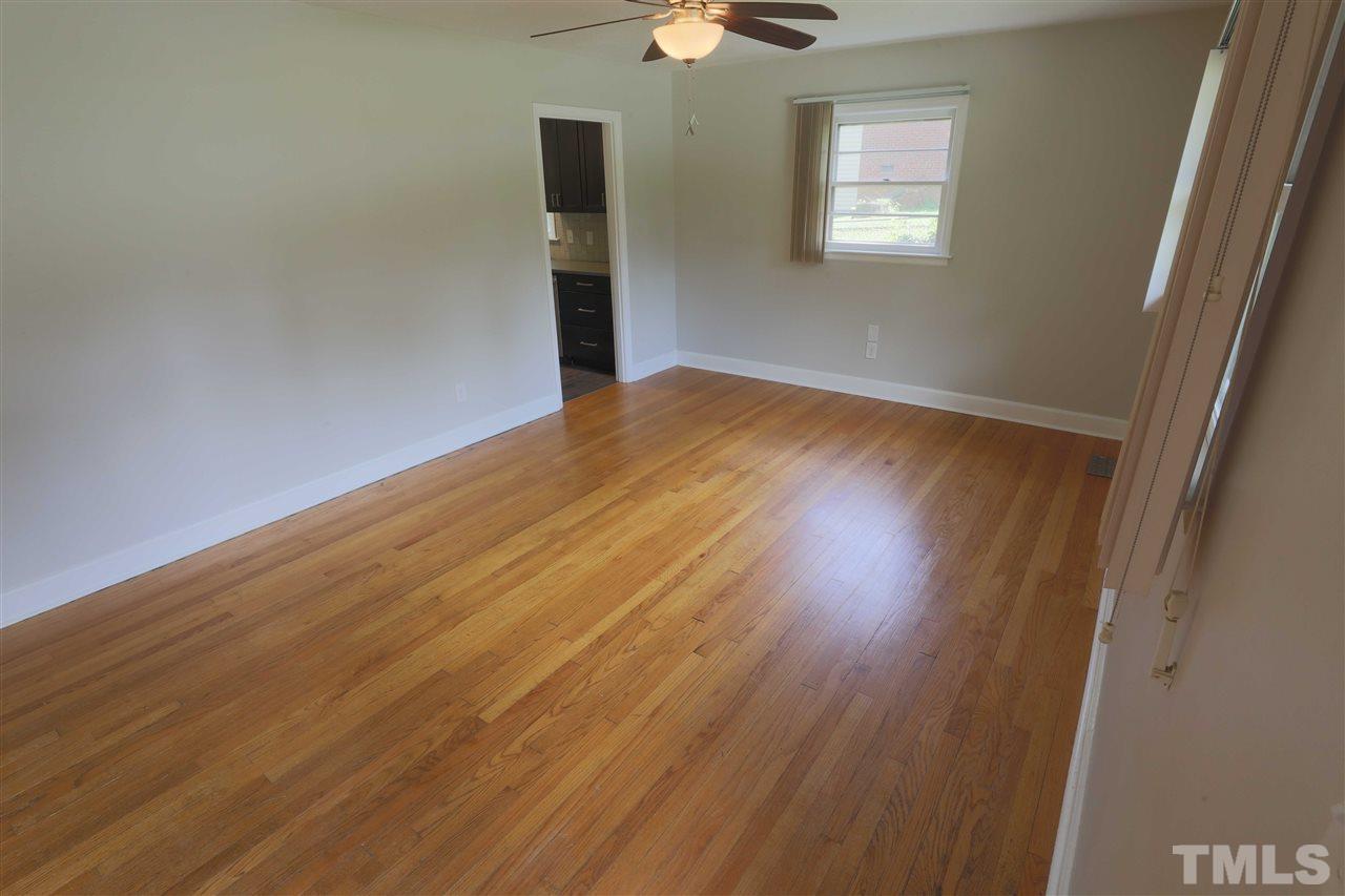 3501 Cranston Road Garner, NC 27529 - Photo 4 of 18 a view of empty room with wooden floor